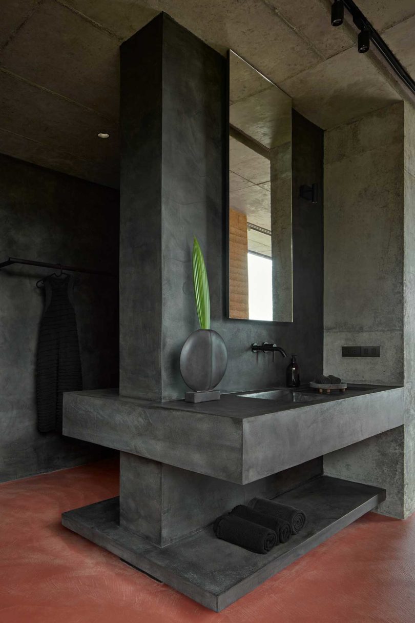 modern bathroom interior with built in sink made of concrete