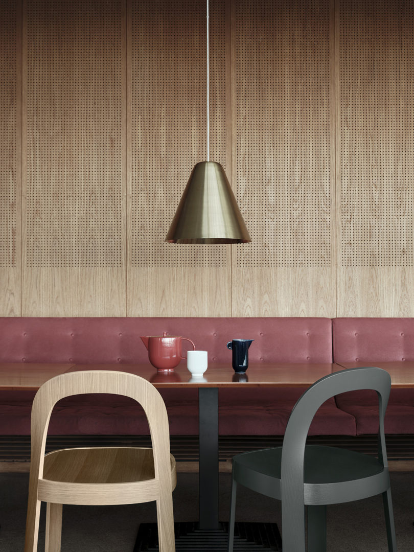 two modern chairs at a dining table