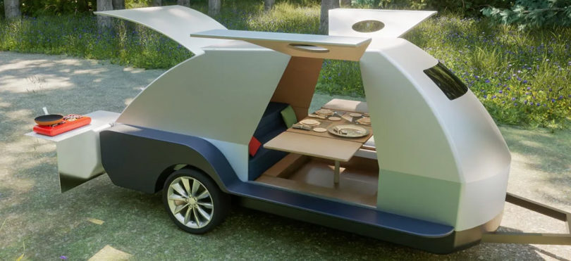 The Boulder shown with its gullwing doors and rear splayed open to show interior and storage space.