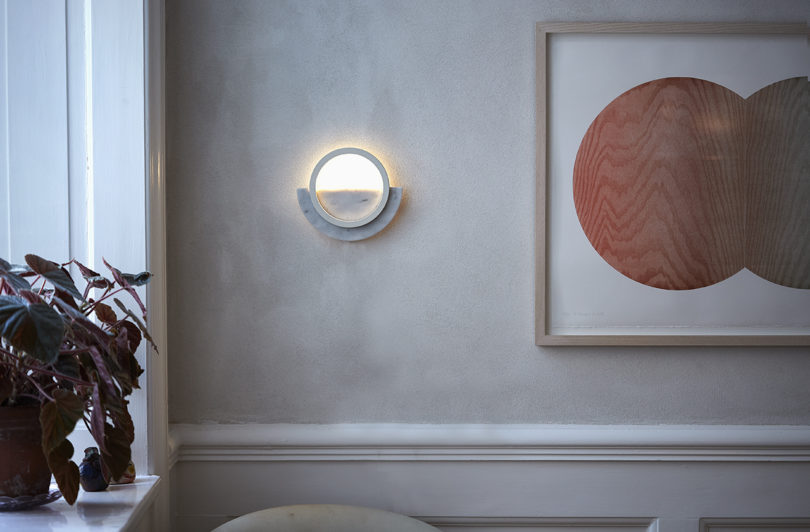 geometric wall lamp in styled space