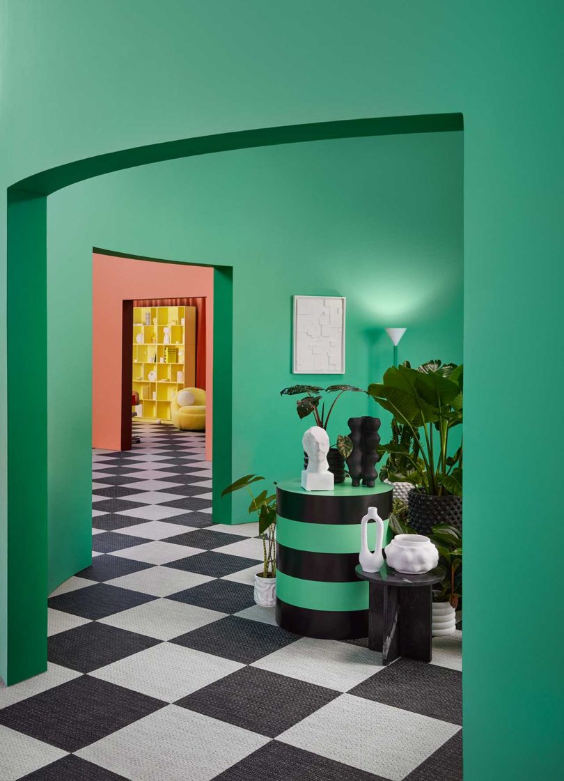 bold color-blocked exhibition green hallway