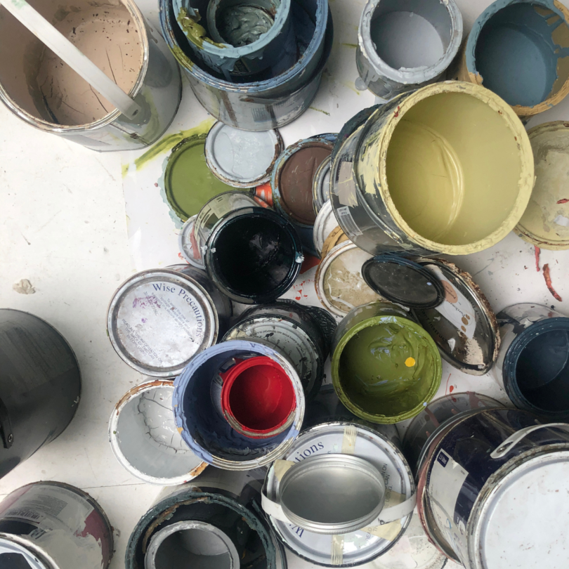 down view of open paint cans