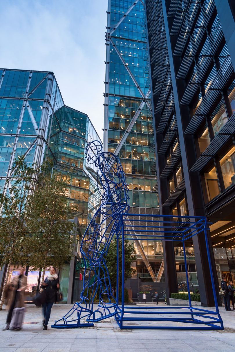 a tall, blue outdoor installation made of steel
