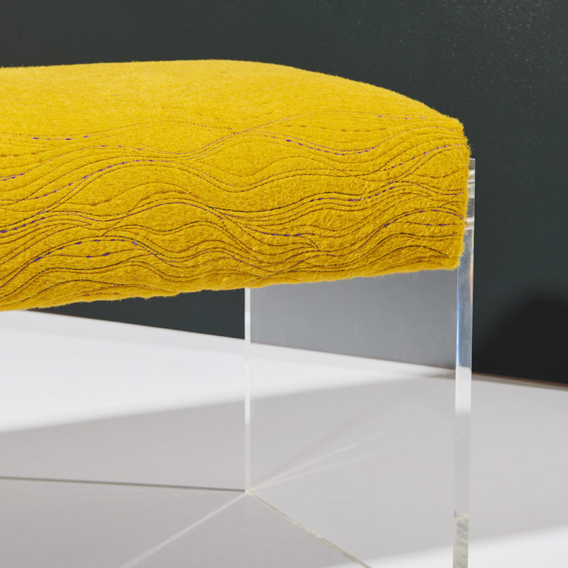 yellow tone on tone fabric upholstered bench cushion