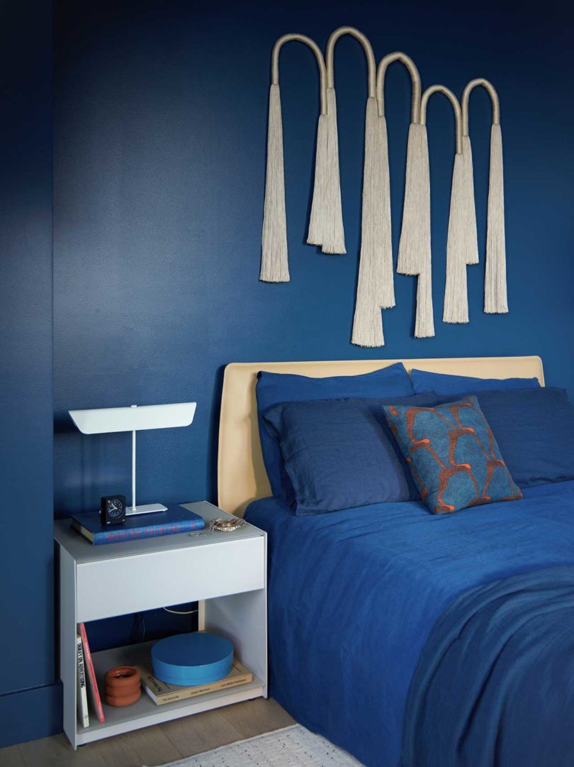 modern bedroom in shades of navy blue