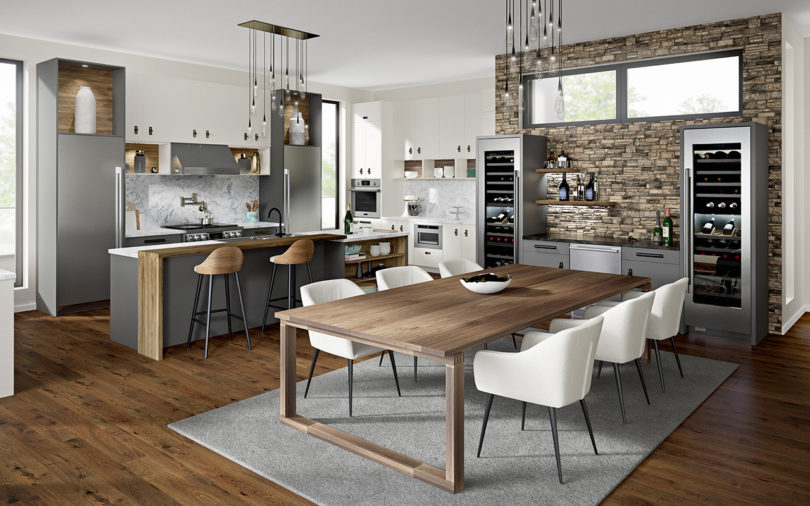 modern kitchen with dining table and chairs, island and stools, and stainless appliances