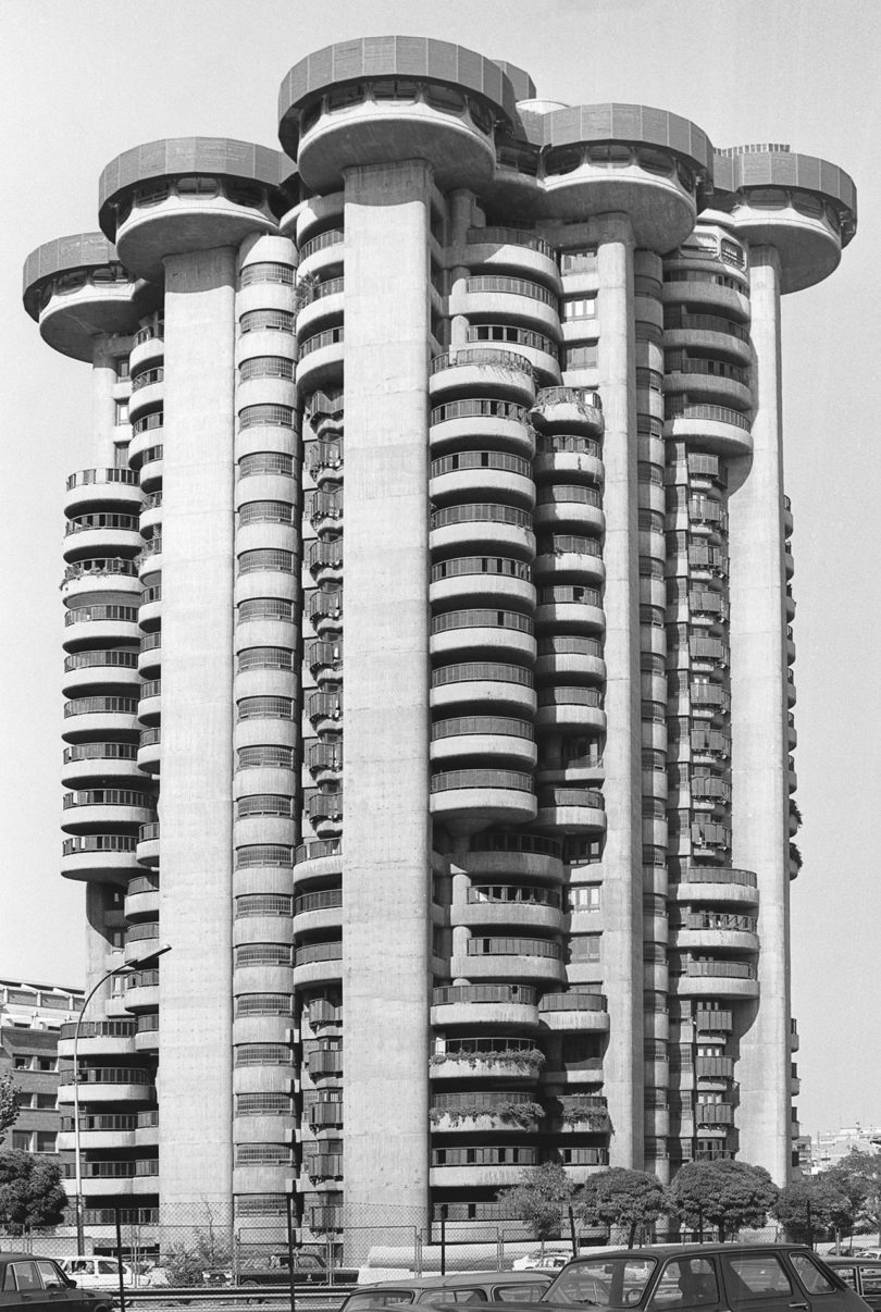 black and white image of a modern tower building