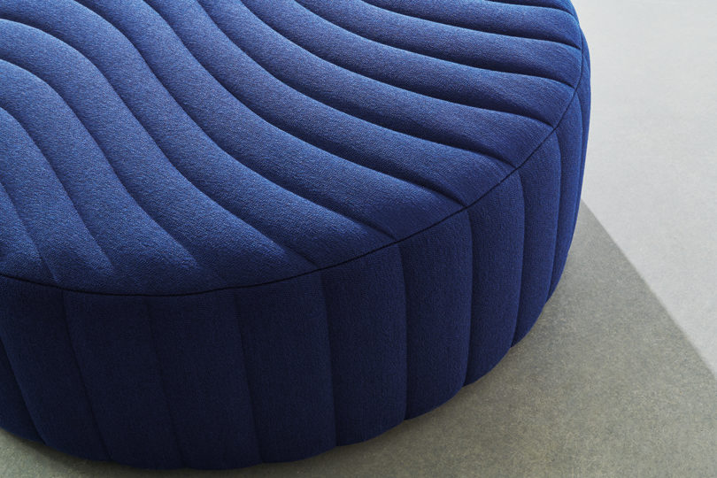 detail of blue upholstered pouf