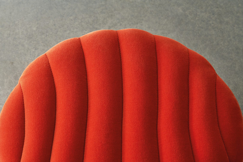detail of red upholstered pouf