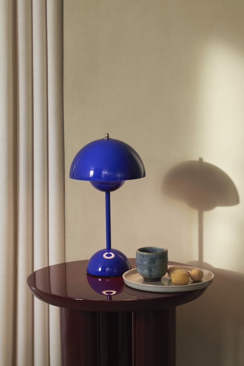 cobalt blue table lamp on side table