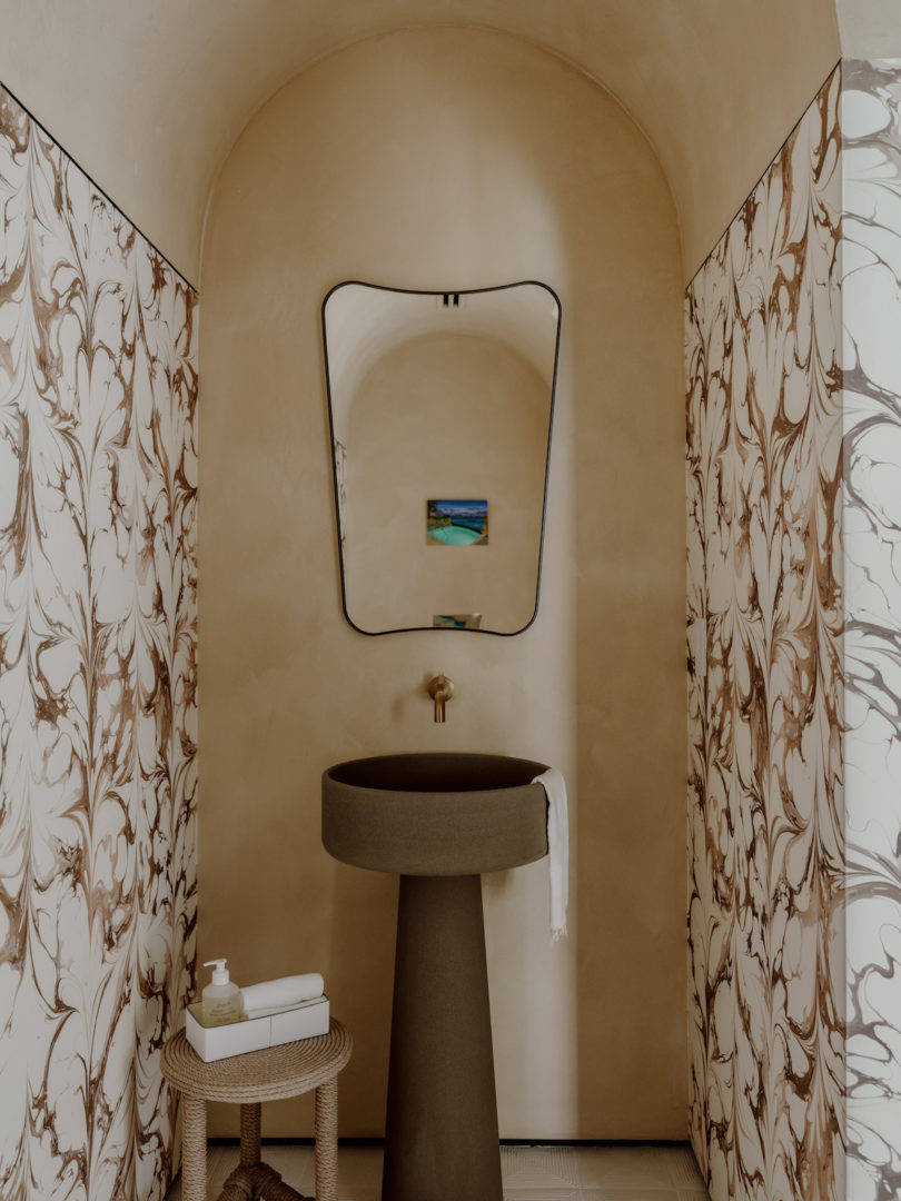 Bathroom with marbled walls