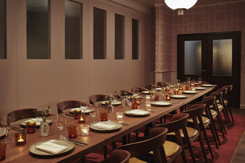 The Hoxton, Shepherd's Bush dining hall with plate settings