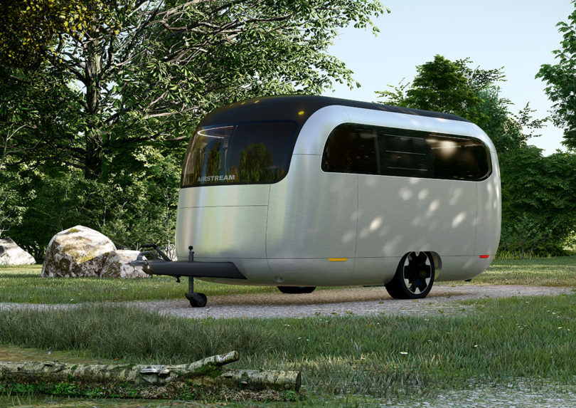 The Airstream Studio F. A. Porsche Concept Travel Trailer parked near grass without tow vehicle.