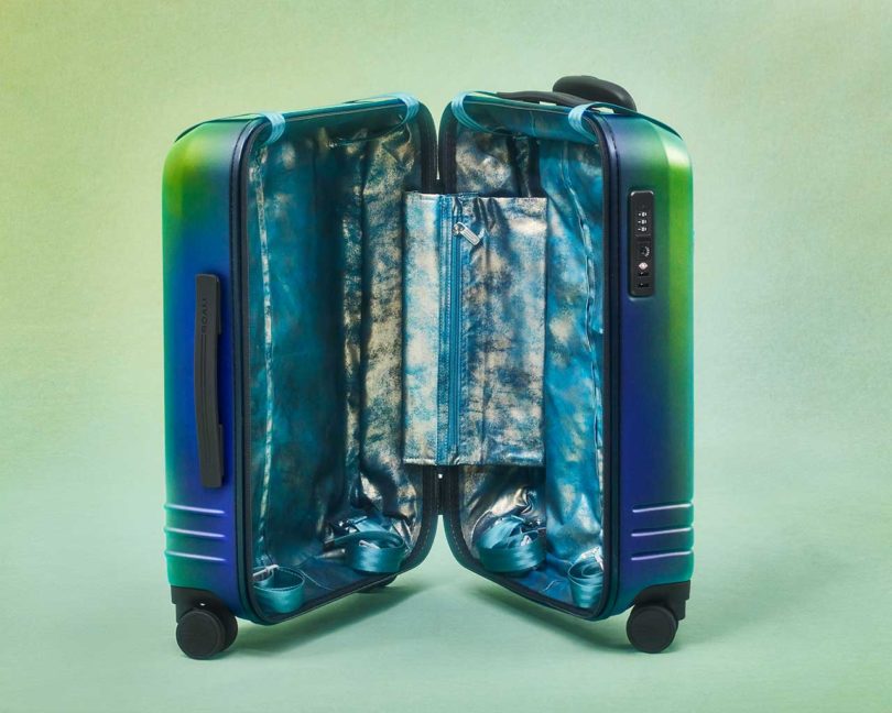 open hand painted suitcase with iridescent lining