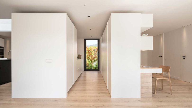 modern home interior looking down hallway