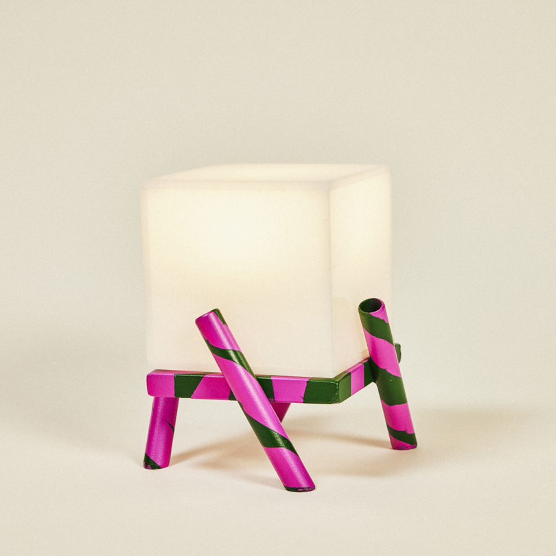 square table lamp with a hot pink and green base