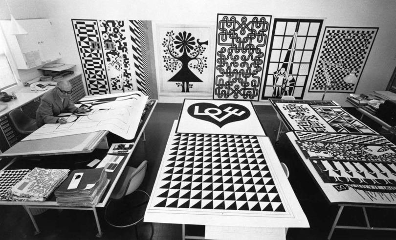 black and white shot looking down at archival artwork by Alexander Girard