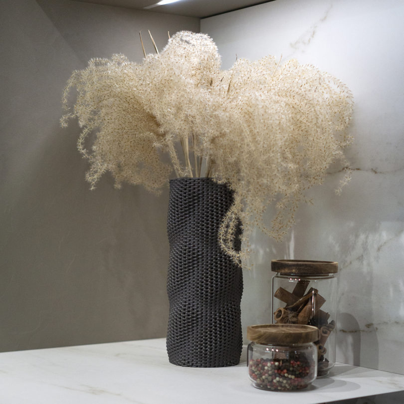 black 3D printed vase with pampas grass