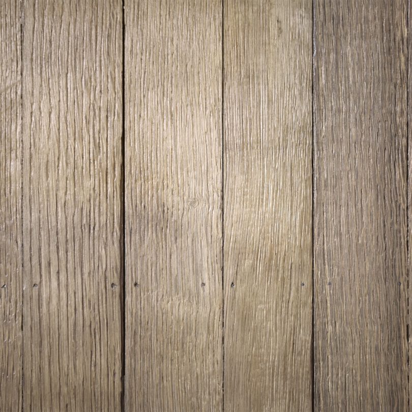A close up of grainy planks of wood. 