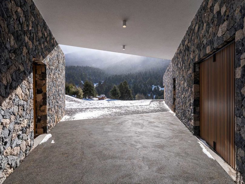 covered interior patio hallway of stone house