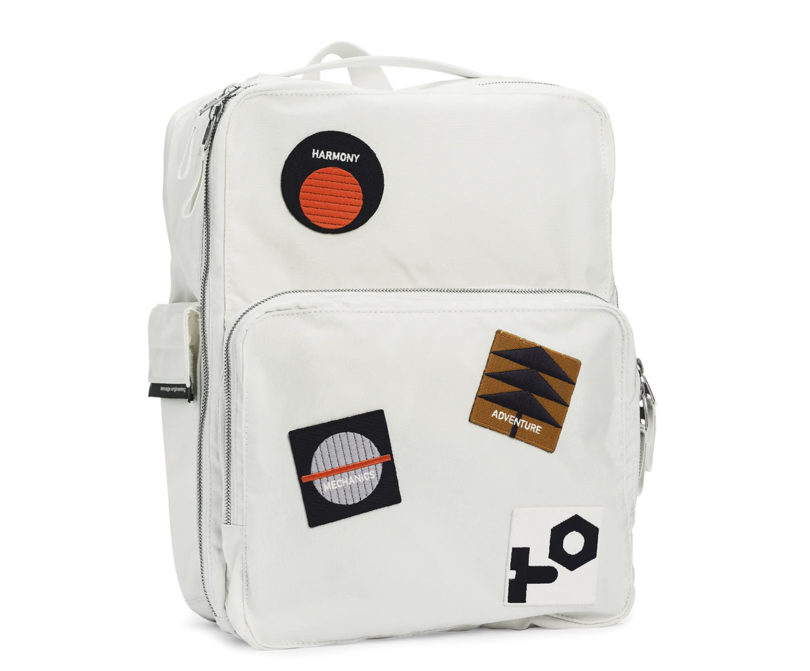 Teenage Engineering all-white Field Series Backpack shown with four patches.