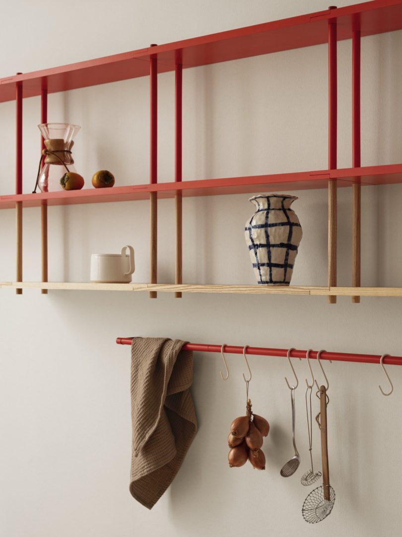 red and yellow shelf mounted on wall