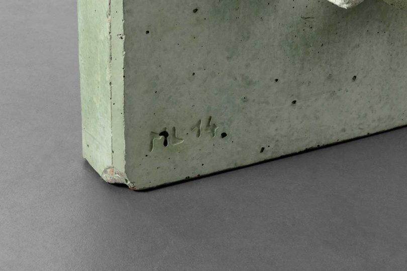 green concrete chair