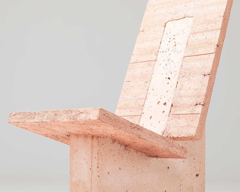 pink concrete chair