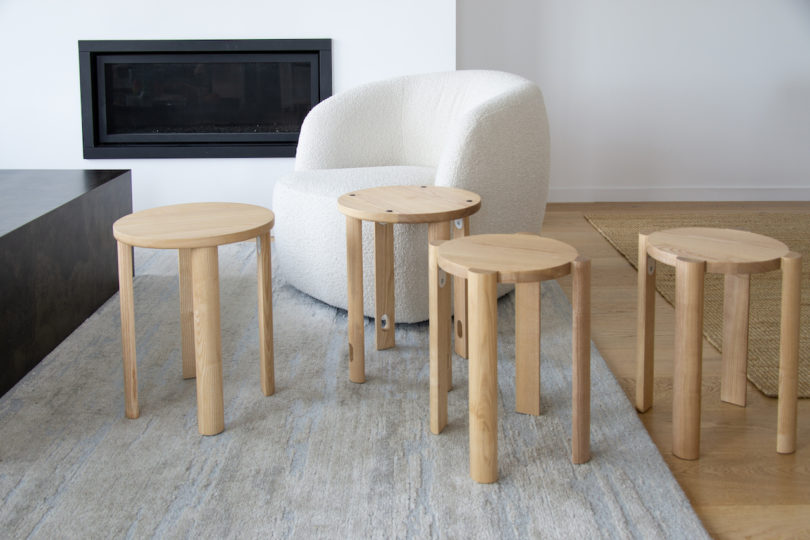 four wooden stools