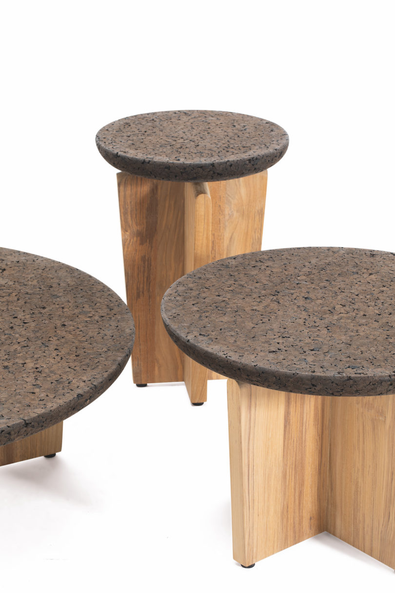 three tables made from black cork and teakwood