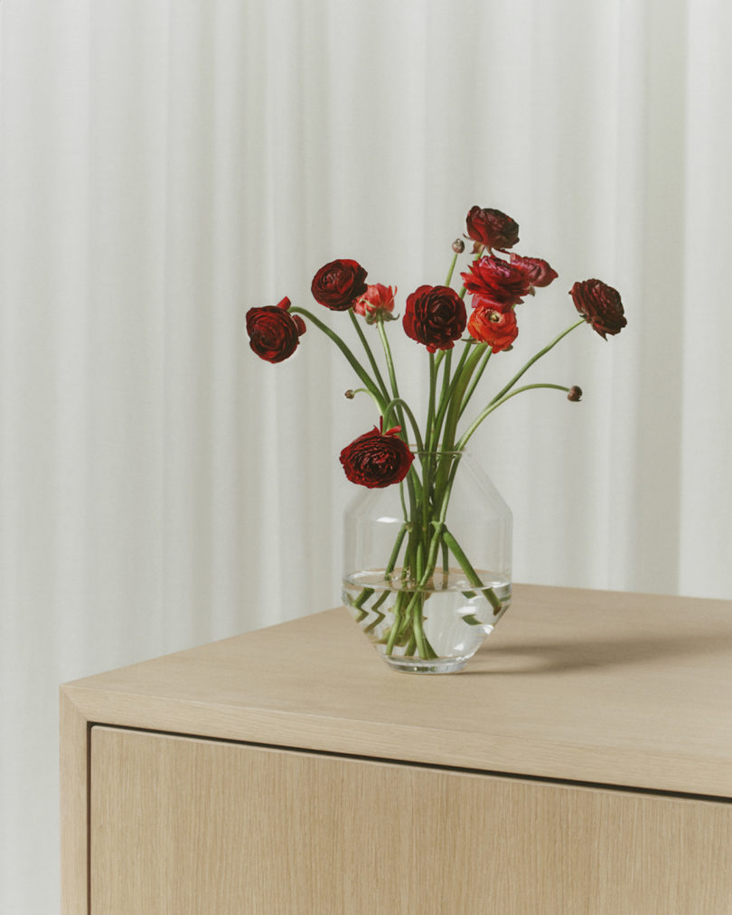 red flowers in a glass vase