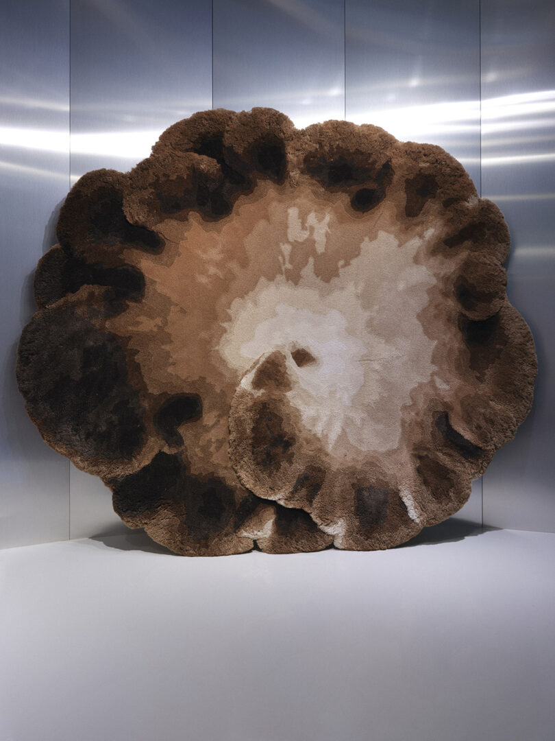 Top view of MSHWY01 brown and tan mushroom rug designed to resemble overhead view of an oyster mushroom.