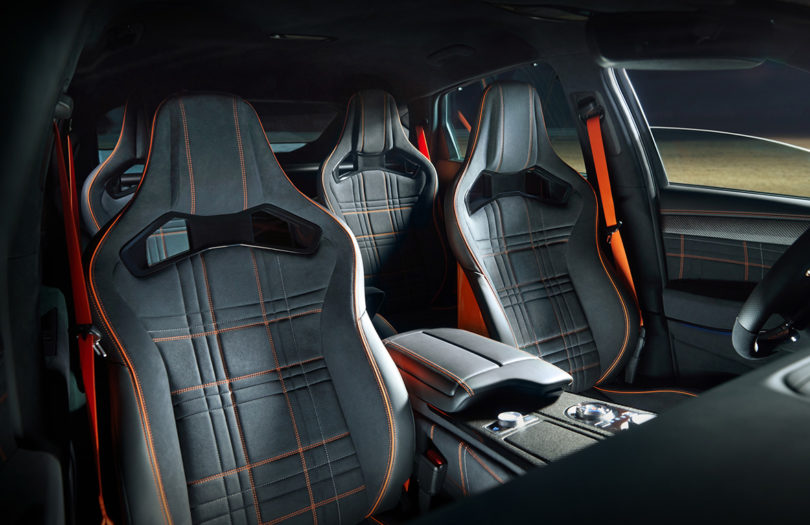 Red orange Genesis GV80 Coupe Concept interior showing seats.