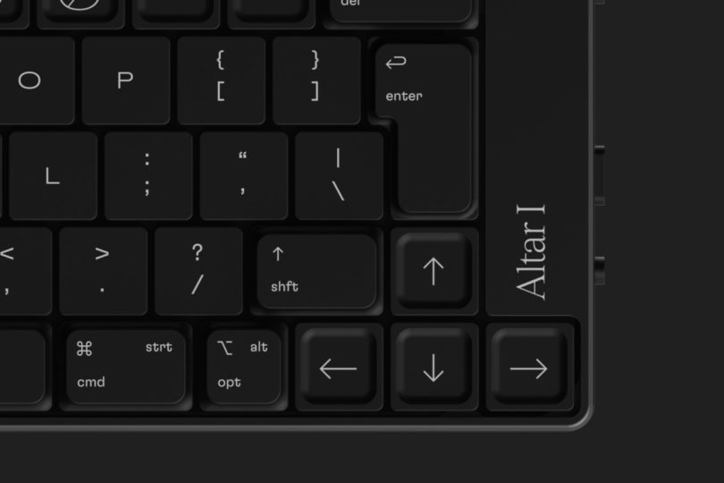 Black minimalist ultra-low profile keyboard shown from top view showing keys against black background.
