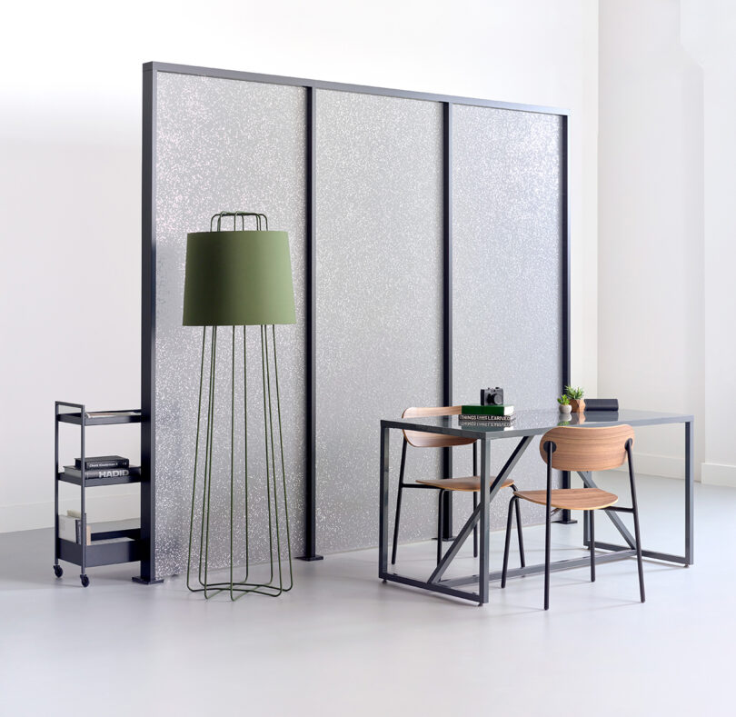 wall screen, floor lamp, desk, and chair styled