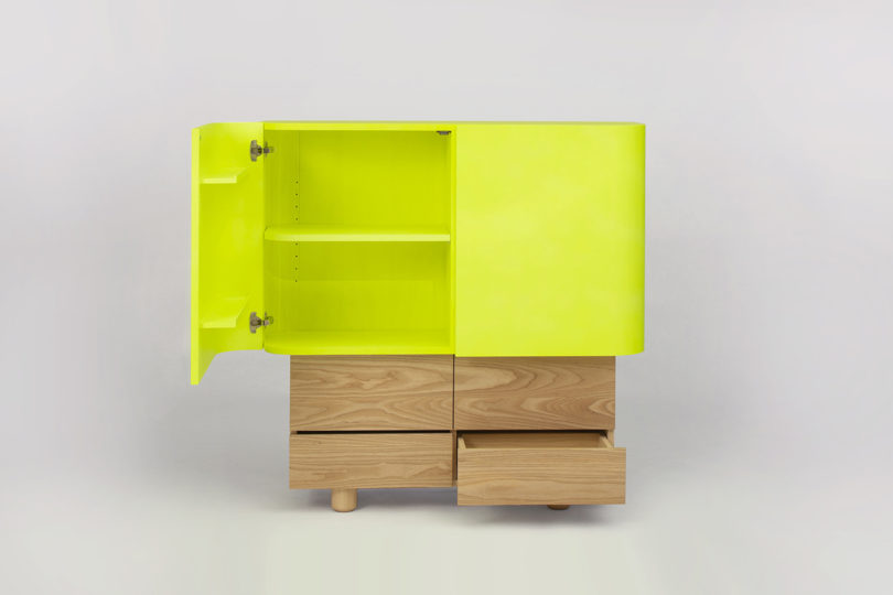 neon yellow and light wood cabinet