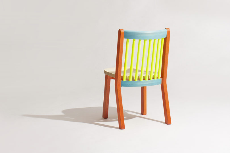 blue, orange, and neon yellow dining chair