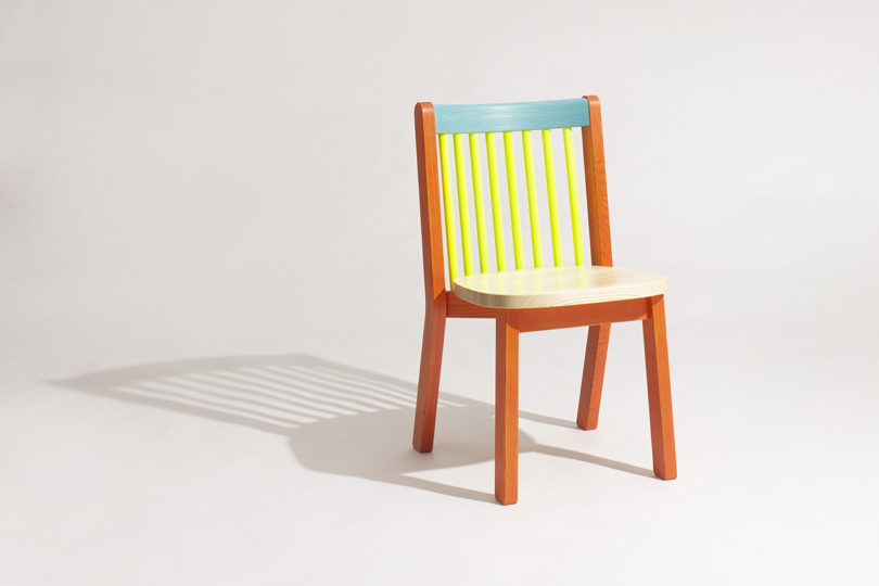 blue, orange, and neon yellow dining chair