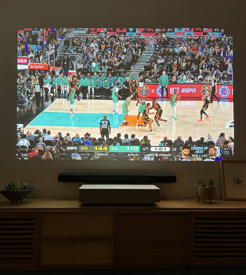 NBA game displayed on LG CineBeam projector.