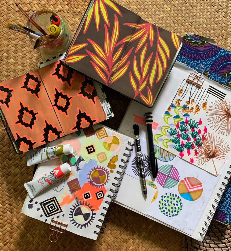 flatlay of colorful sketches and patterns