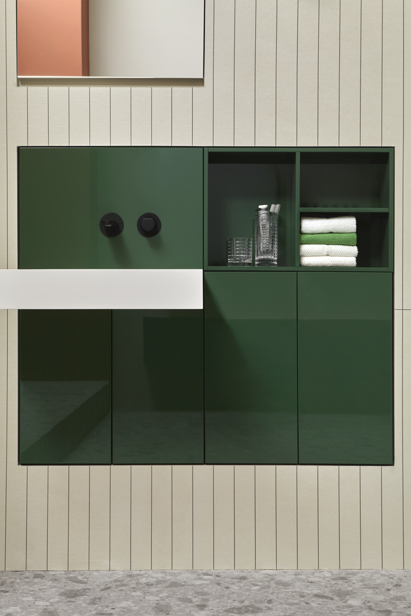 modern bathroom with small modular dark green vanity