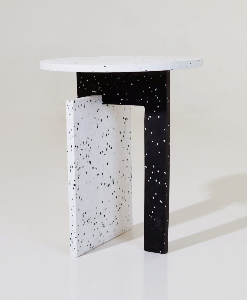 round confetti and black side table