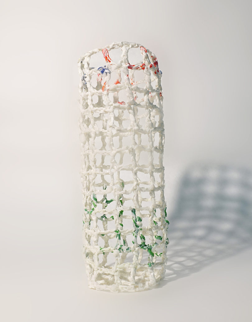 white abstract vessel made using recycled plastic bags