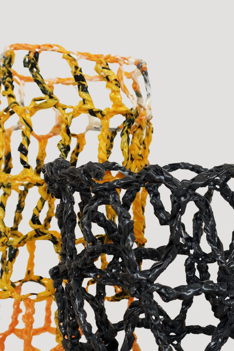 detail of yellow and black abstract vessels made using recycled plastic bags