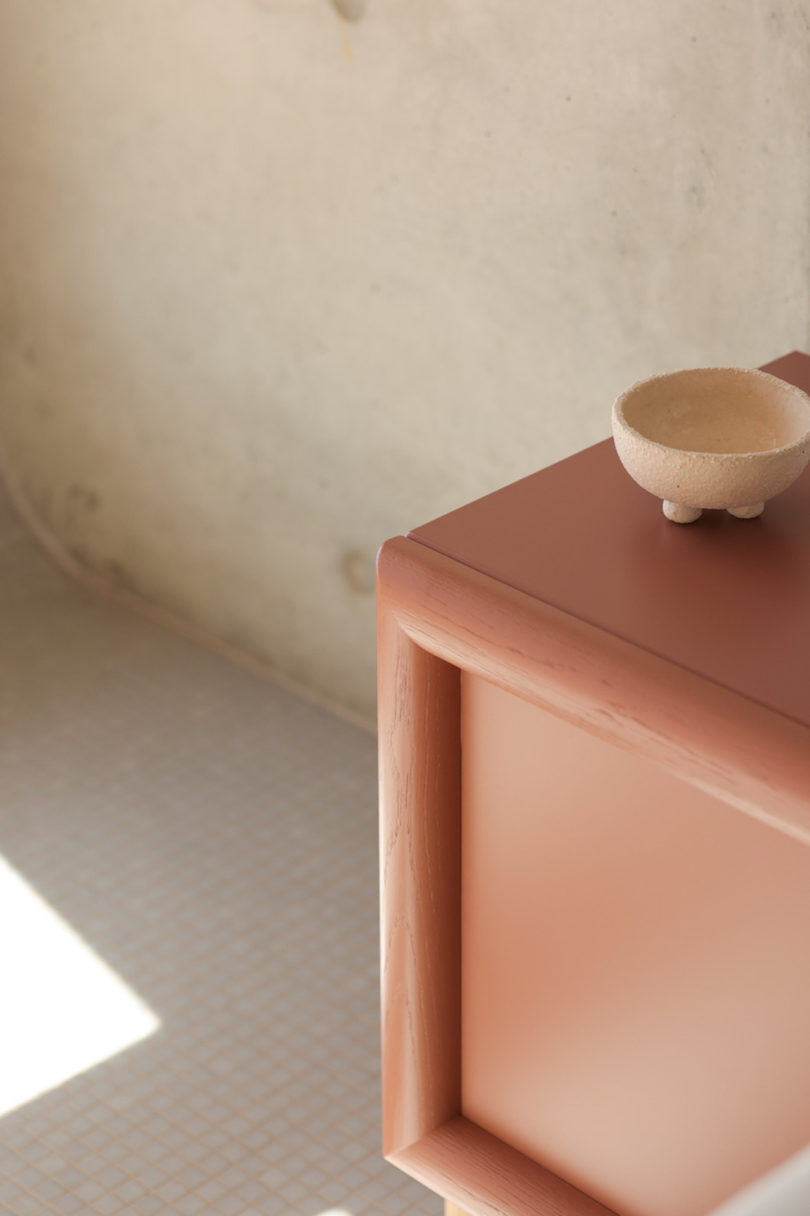 detail of peach bedside table