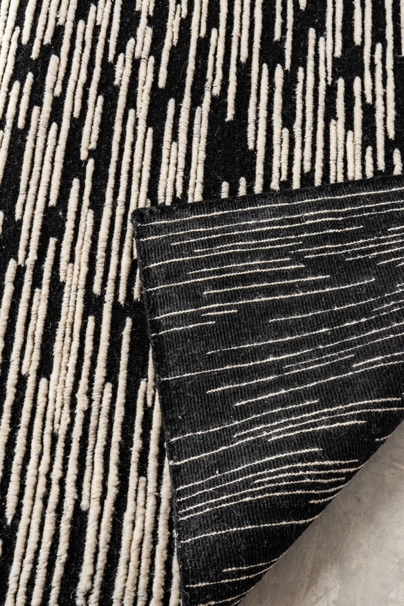 close-up of black and ivory rug