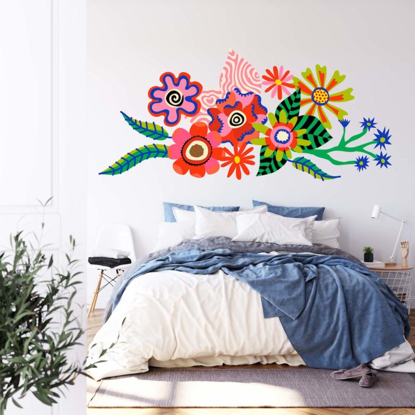 maximalist floral decal above bed