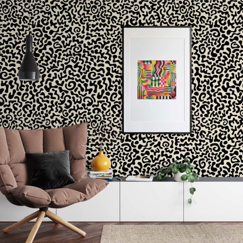 black and white maximalist wallpaper in living room