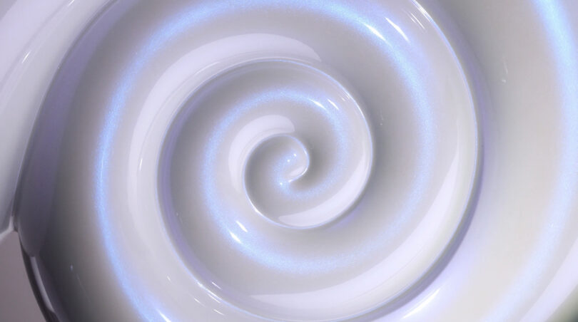 closeup of iridescent spiral of anniversary speaker