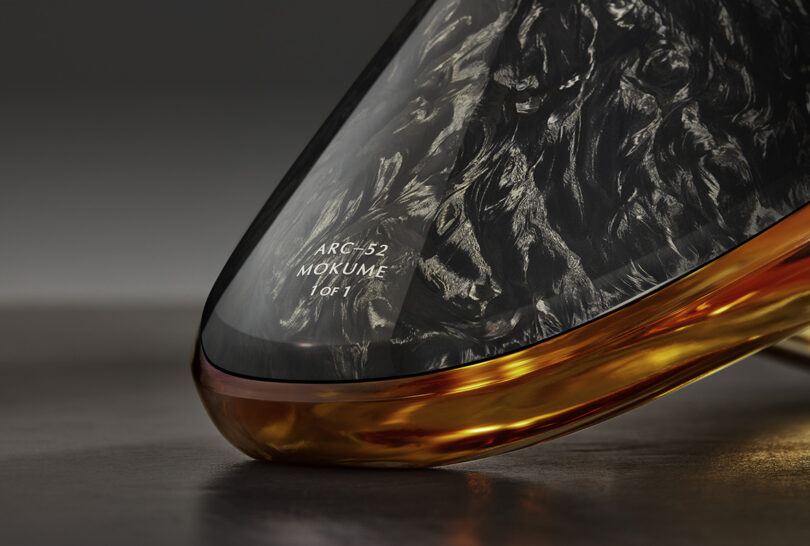 Back detail of Bowmore x Aston Martin whisky decanter.
